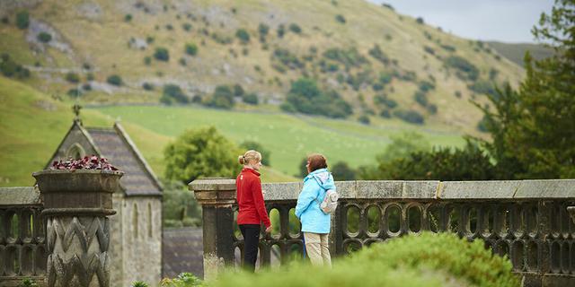 Ranger and visitor in Italian Garden Ilam Park web 1236012645